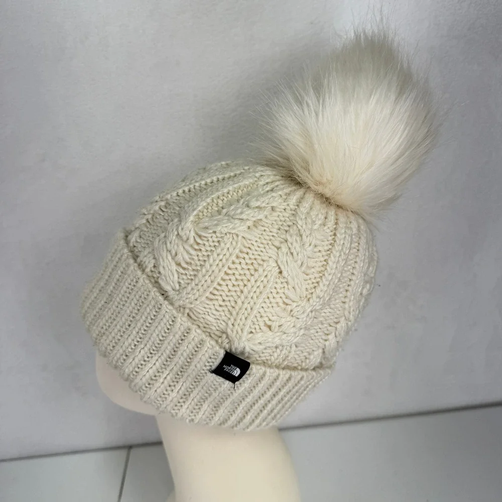 The North Face Kids OS Beanie Cable Knit Faux Fur Pom Pom Cream Hat NF0A7WFL